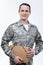 Positive military man holding a folder