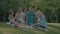 Positive multi generation family enjoying picnic