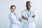 positive multiethnic doctors in white coats