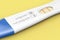 Positive Plastic Pregnancy Test Closeup. 3d Rendering