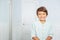 Positive portrait of little boy at home smiling