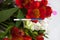 Positive pregnancy test with a bouquet of alstroemeria flowers