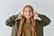 positive preteen girl in knitted hat