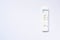 Positive rapid corona test on white background. Quick result of antigen sars-cov-2 test done by infected person. Copy space in the