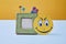 Positive thinking or Optimistic Attitude and Happy Concept. Photo frame and paper smiley face. Mockup and template