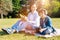 Positive vibrant family having a lovely picnic