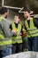 Positive workers in high visibility vests