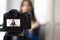 Positive young adult Indian influencer girl shooting video