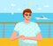 Positive young man in sunglasses standing on the deck of a sea ship, yachts sailing behind him