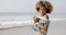 Positive Young Woman On The Beach