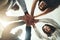 Positivity fuels a great amount of success. Closeup shot of a group of businesspeople joining their hands together in a