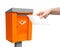 Post box and female hand with white letter