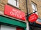 Post Office shop signs, Broadway Market, London UK.