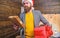 Post for santa claus. Man bearded hipster wear santa hat hold bunch of letters and gift box. Gifts delivery service