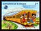 Postage stamp Grenadines of Saint Vincent 1989. Mickey and Minnie Mouse Palace on Wheels train