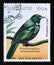 Postage stamp Laos, 1990. Tui Prosthemadera novaeseelandiae bird