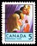 Postage stamp printed in Canada shows Children Praying, 5 Â¢ - Canadian cent, Christmas serie, circa 1969