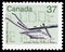 Postage stamp printed in Canada shows Wooden plough, Heritage Artifacts serie, circa 1983