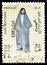 Postage stamp printed in Iraq shows Iraqi woman costume, Native costumes serie, 25 Iraqi fils, circa 1972