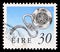 Postage stamp printed in Ireland shows Enamelled Latchet Brooch, Irish Heritage and Treasures 1990-97 serie, circa 1990