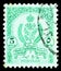 Postage stamp printed in Libyan Arab Jamahiriya shows .Coat of Arms (1960), serie, 5 Libyan millieme, circa 1960