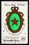 Postage stamp printed in Morocco shows Emblem in the national colors, 25th anniversary of the Royal Armed Forces serie, circa 1981