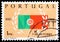 Postage stamp printed in Portugal shows Portuguese Flag with Laurel Branches, 50th Anniversary of the Republic serie, 1 $ -