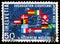 Postage stamp printed in Switzerland shows Nuclear fission phase & flags of participating countries, C.E.R.N. serie, circa 1966