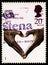 Postage stamp printed in United Kingdom shows Hands forming heart, National Health Service serie, circa 1998