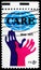 Postage stamp printed in United States shows Hands Reaching for `CARE`, Care Issue serie, circa 1971