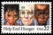 Postage stamp printed in United States shows Youths and Elderly Suffering from Malnutrition, Help End Hunger serie, circa 1985