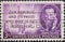 A postage stamp printed in the US showing a portrait of Pulitzer, the Statue of Liberty, and the words, â€œOur Rep