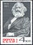 Postage stamp printed in USSR with a picture a portrait of Carl Marx 1818-1883 for the 150th anniversary.