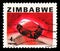 Postage stamp printed in Zimbabwe shows Garnet, 4 Zimbabwean cent, Gems serie, circa 1980
