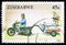 Postage stamp printed in Zimbabwe shows Mail Motorcycle and Trailer, Animals, Hand Crafts and Transportation serie, 45 Zimbabwean