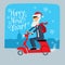 Postcard with the New Year. Santa Claus in a jacket goes on a motor scooter