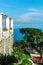 A postcard overlooking the garden and terrace of Villa Rufolo and the Tyrrhenian Sea. Ravello, Campania, Italy