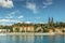 Postcard view of famous Vysehrad standing on a rock and Rasin Embankment,Prague,Czech republic.Riverfront colorful