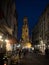 Postcard view of illuminated Belfry of Bruges Belfort van Brugge medieval historical bell clock tower at night Belgium