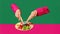 Poster. Contemporary art collage. Female hands hold female legs by which eating fruits against pink-green background.