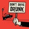 Poster in hand with car crash and text Don`t Drive Drunk