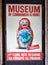 Poster in the Museum of Communism in Prague, Czech Republic. Poster of very angry Matryoshka or nesting doll.
