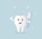 A poster about daily oral hygiene. Funny cute character - white healthy tooth, which holds a toothbrush with paste. It`s important