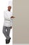 Poster, portrait and black man chef with hand pointing to studio for checklist, menu or space on white background