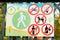 poster with prohibitory signs in the park