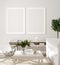 Poster, wall mockup in beige interior with white sofa, wooden table and plants, Scandinavian style