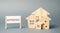 A poster with the word Appraisal and a miniature wooden house. Real estate. Rate the property / home. Evaluation. Apartments,