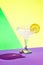 Poster. Zesty margarita adorned with salt and lemon slice showcased against dynamic vibrant studio background.