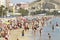 Postiguet beach in Alicante full of tourists due to the good weather in the month of October