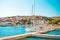 POSTIRA, CROATIA - JULY 14, 2017: Lots of fancy yachts in the harbor of a small town Postira - Croatia, island Brac